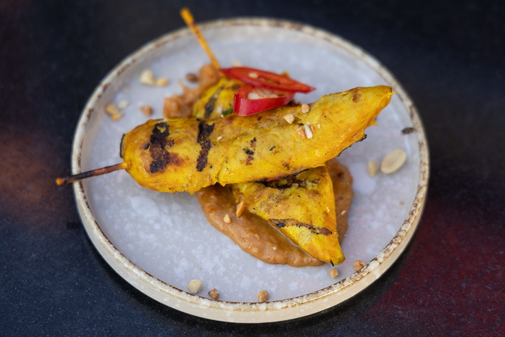 Chicken satay on plate Chaan Thai Restaurant, Paddington