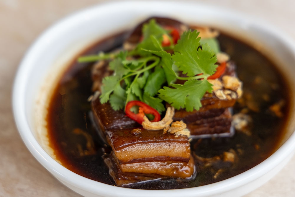 Thai food on a plate at Chalong Chapel Hill
