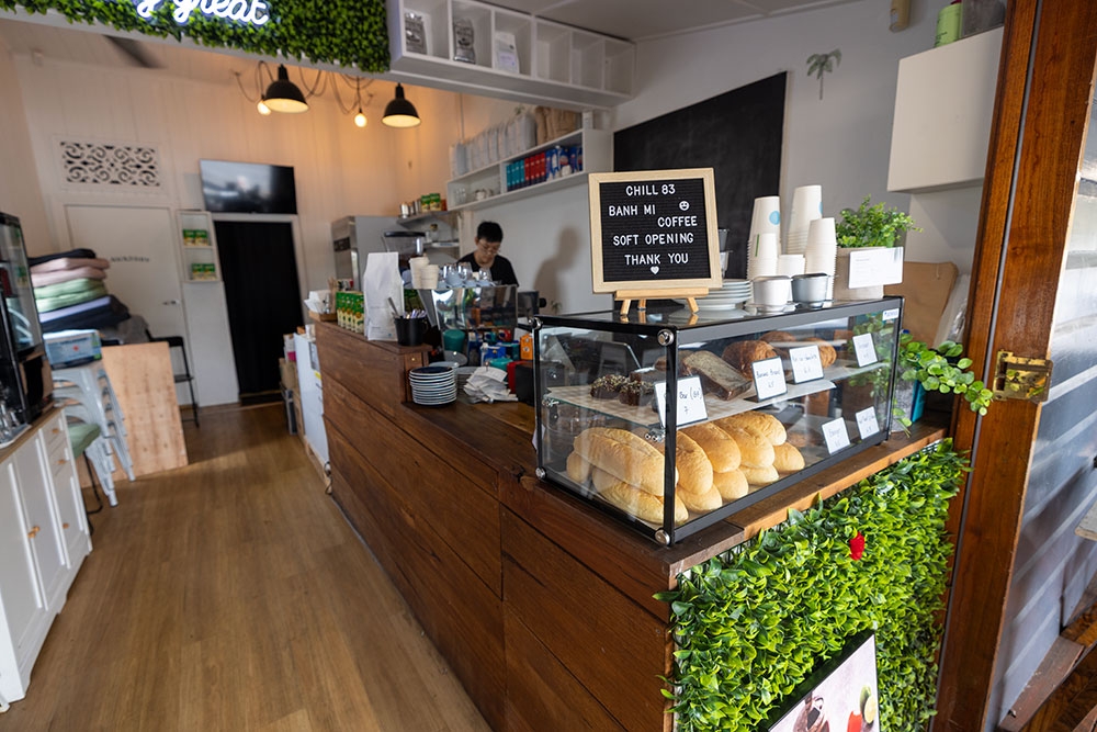 Man behind counter at Chill-83-Vietnamese-Fusion-Cafe