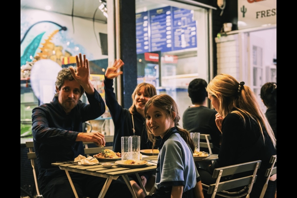 Four happy diners at Clayfield Cantina