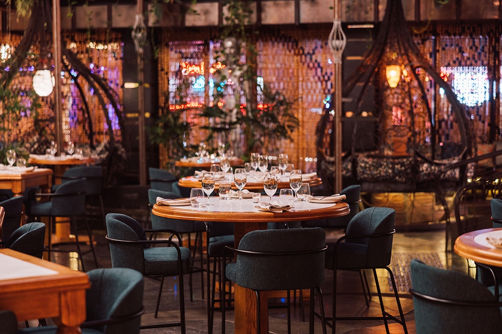Green dining chairs and booths at Cloudland Garden Restaurant Fortitude Valley