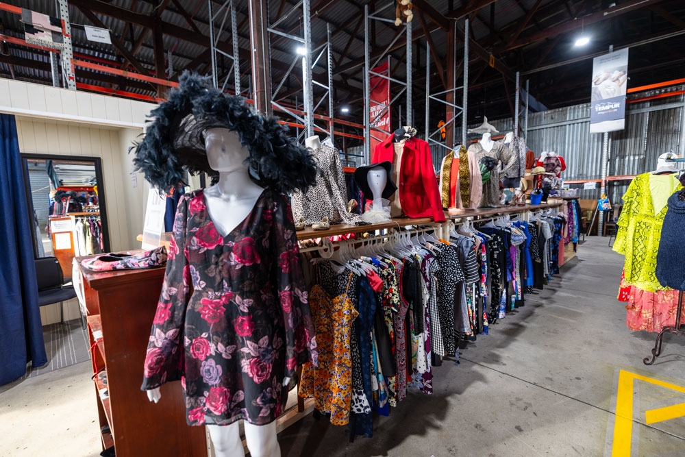 Retro/vintage clothing for sale inside Connected Inc Op Shop Virginia 