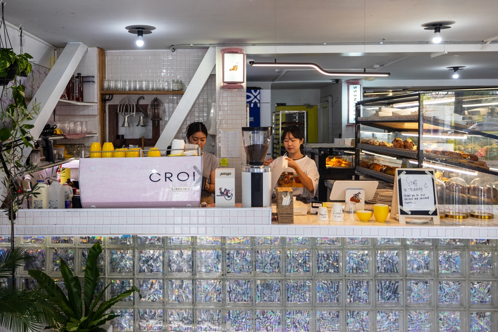 Coffee counter and glass cabinet with pastries, Croix Croissant Newstead