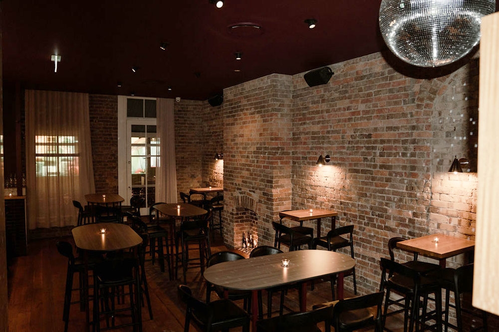 Tables and chairs in Never Enough Fortitude Valley