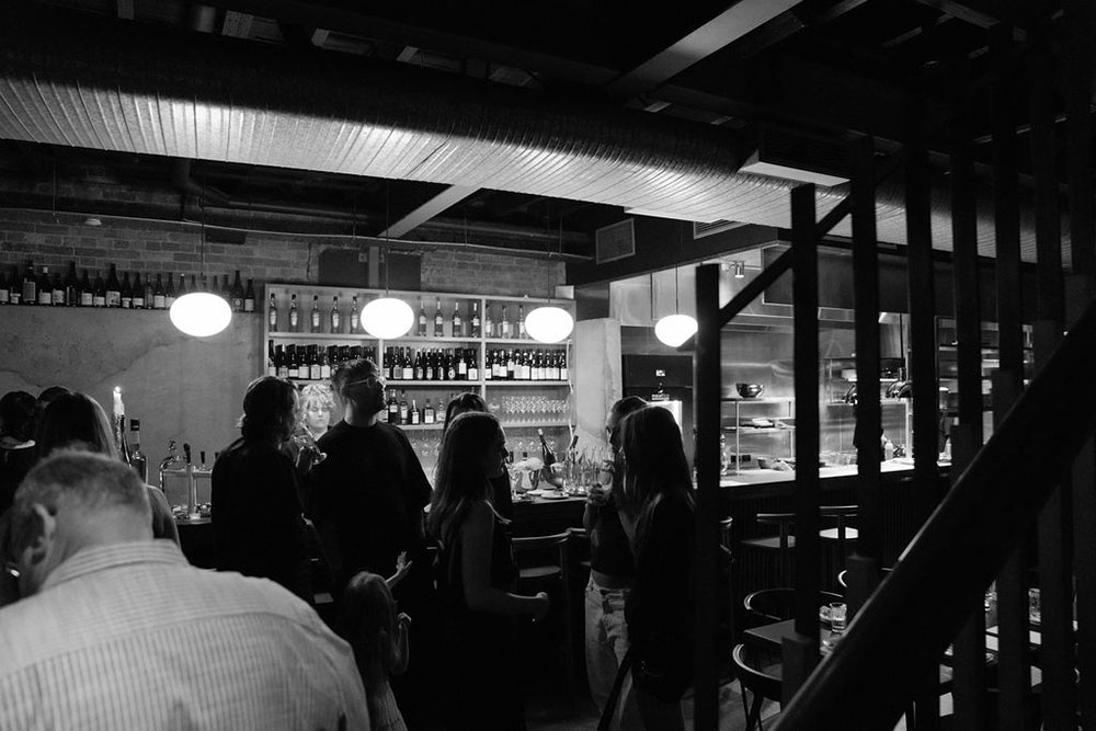 Patrons seated in Never Enough Fortitude Valley