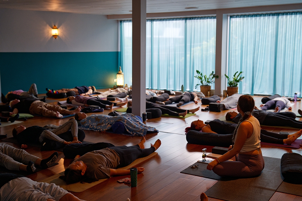 group of people doing yoga