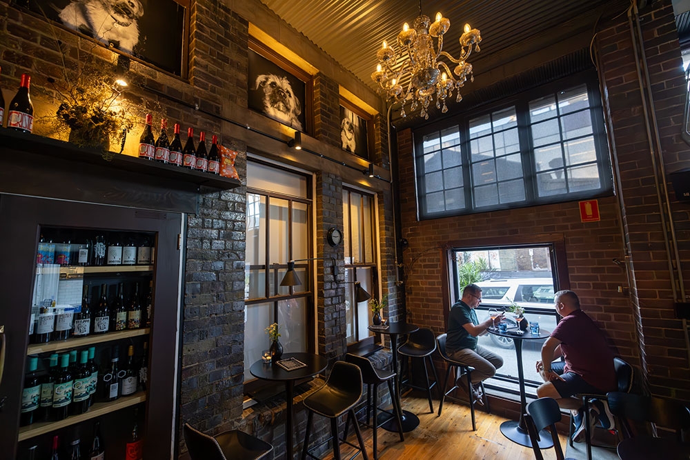 People seated in window of Dark Blue Fortitude Valley
