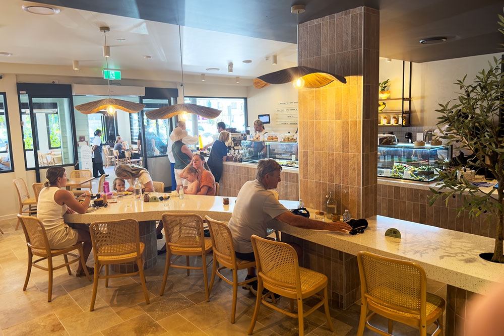 Diners seated inside Dopo Eatery Milton