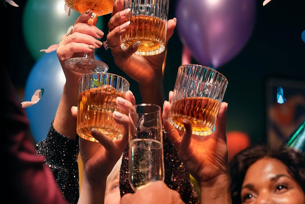 People with drink glasses at Dream Karaoke Brisbane CBD