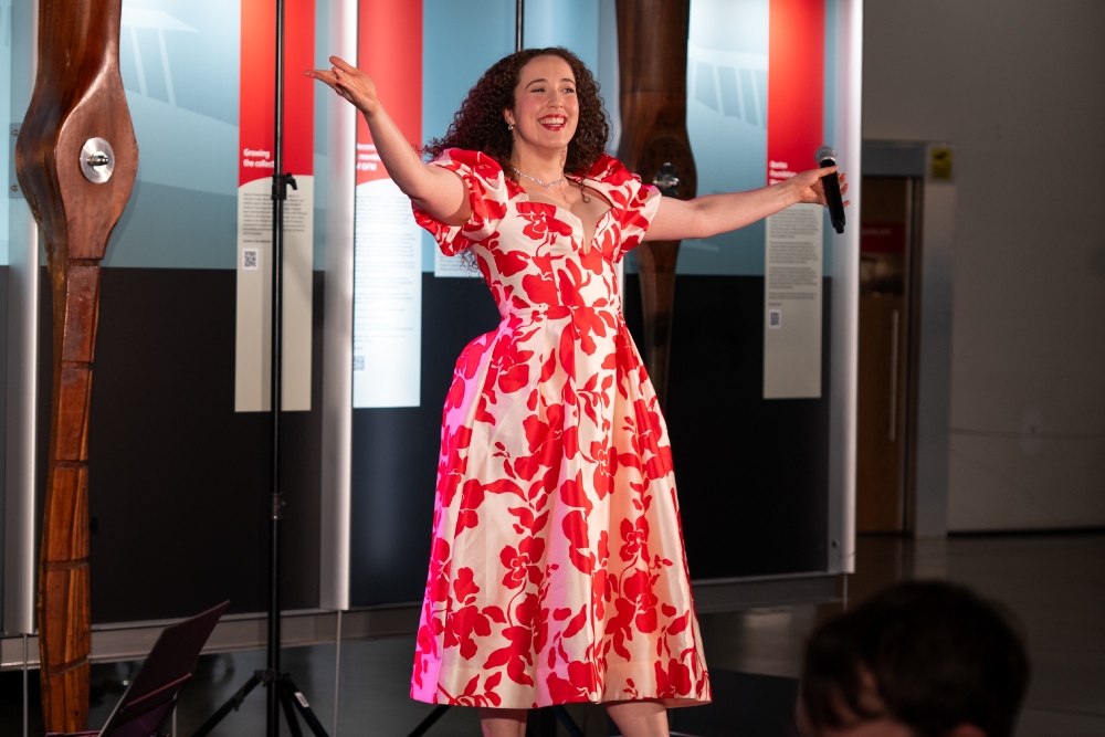 Woman in dress singing