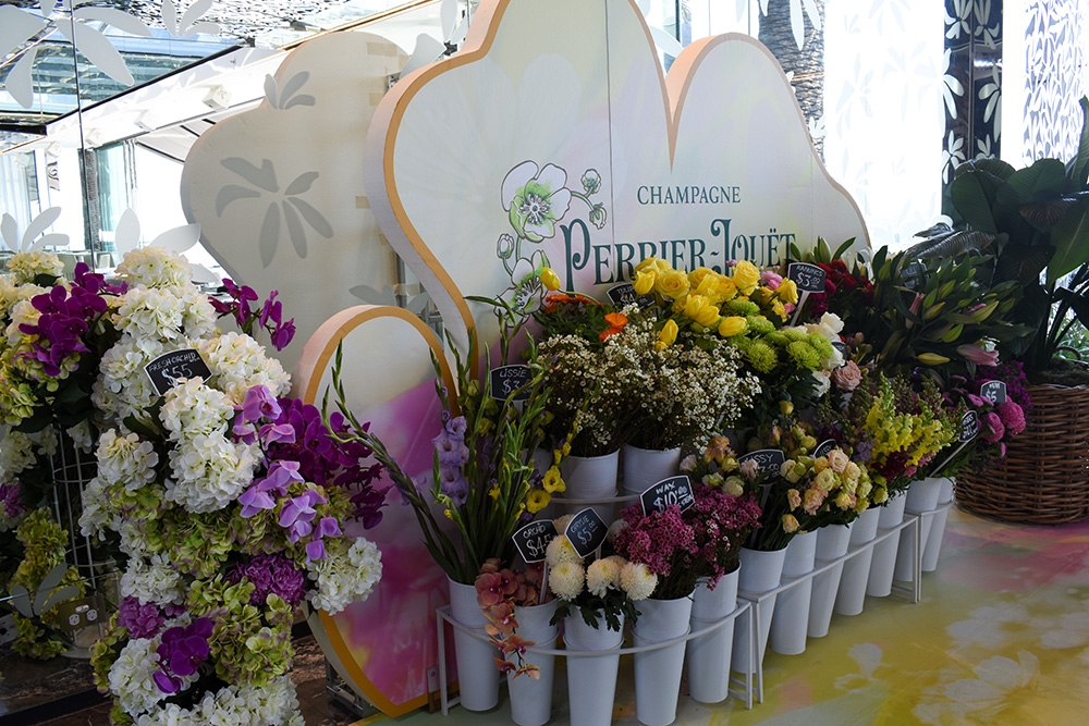 Flowers with French Champagne Perrier-Jouët sign