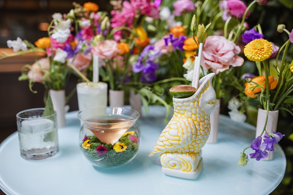 Cocktails and flowers at the Sky High Champagne Hour at the Emporium Hotel