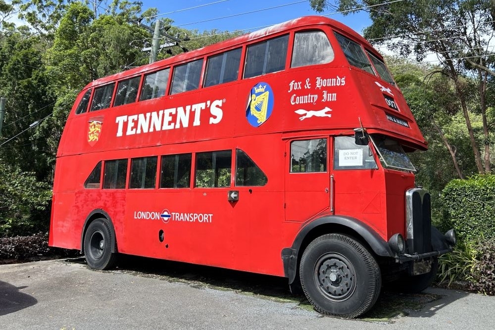 Red double decker bus at the Fox & Hounds Country Inn, Wongawallan