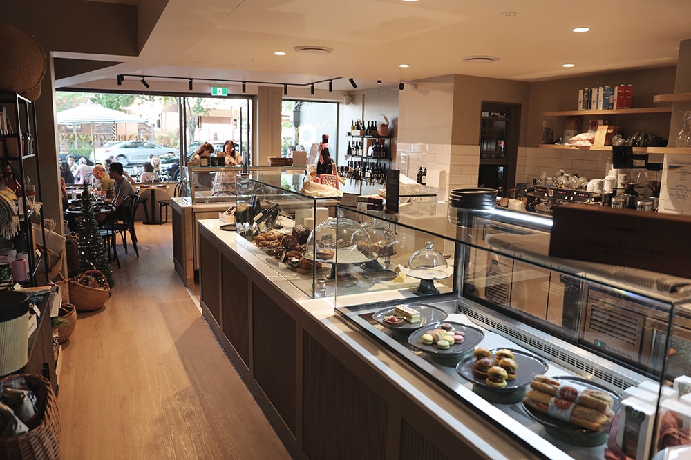 Counter of cheese and deli at Grape & Grazing New Farm