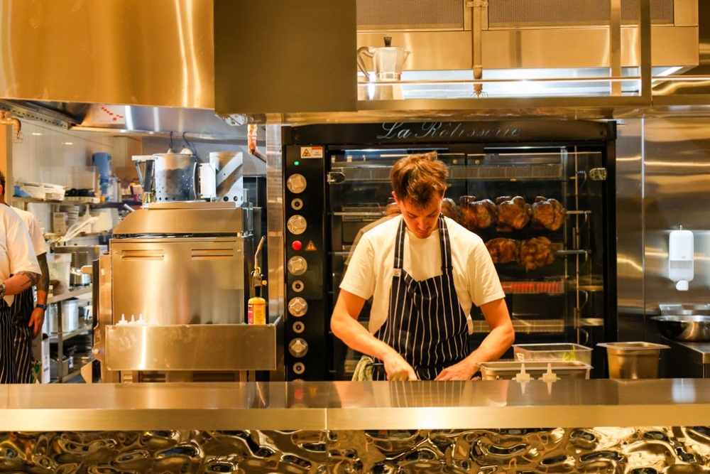 Chef in kitchen at The Greenhouse Newstead