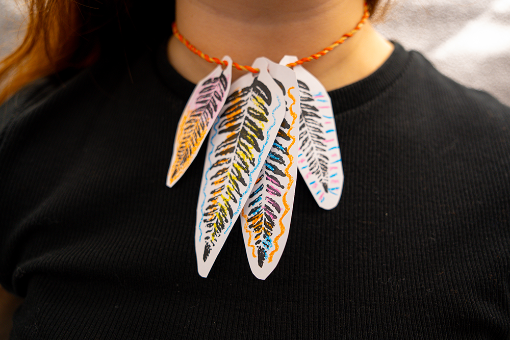A girl wearing a necklace 