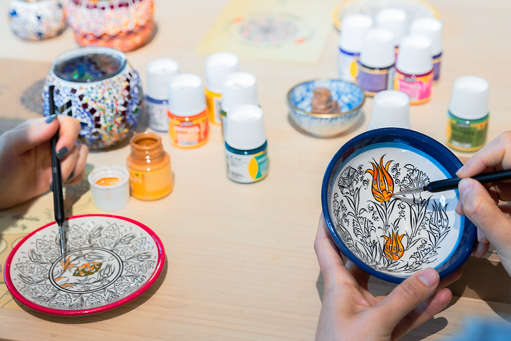 Ladies painting ceramic dishes ART MASTERCLASS Fortitude Valley