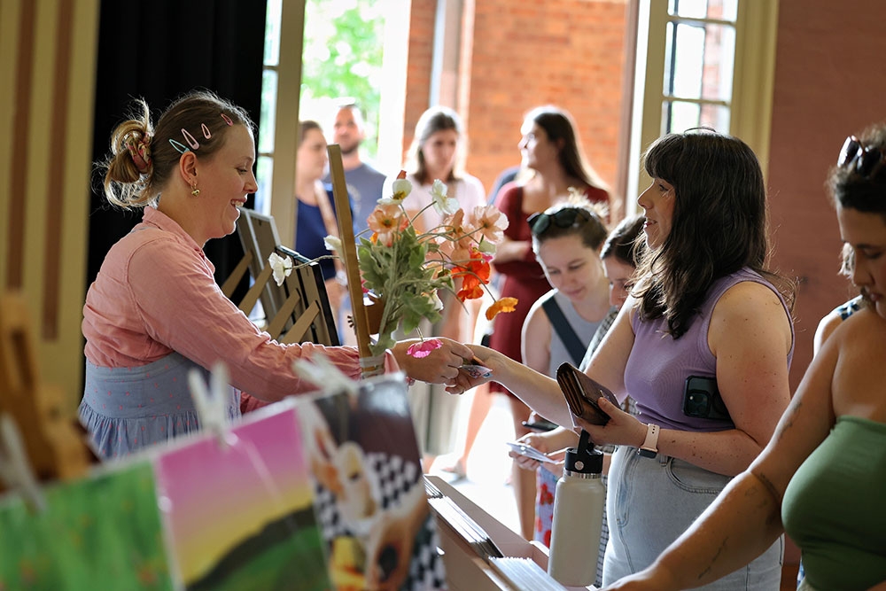 Women browsing stalls at The BIG Handmade Christmas Design Market
