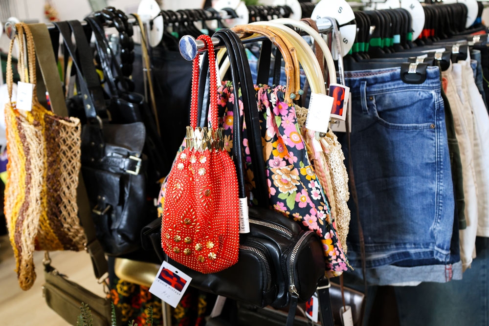 Vintage clothing and bags on rack for sale at iKoniK Vintage Gaythorne
