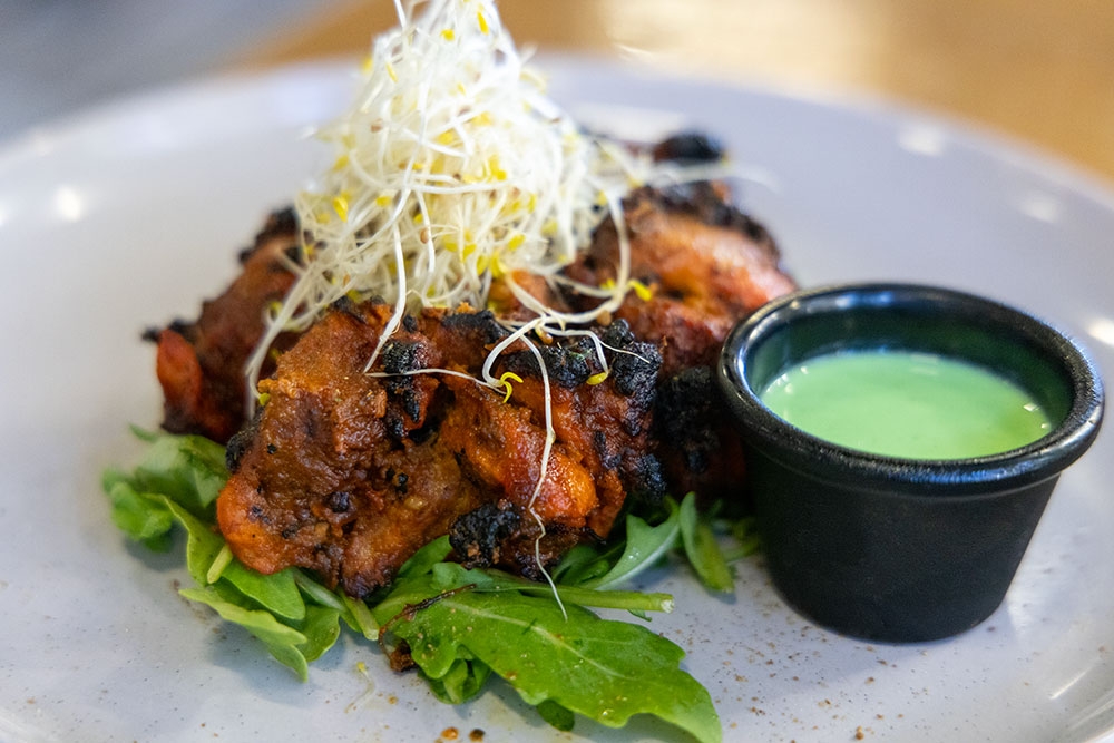 Plate of tandoor chicken at Indian Room Milton