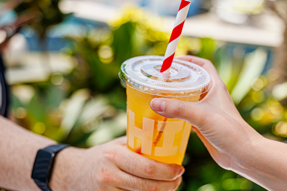 cold drink in hand