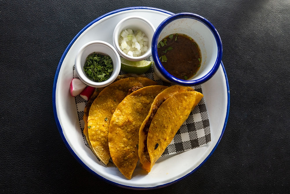 Tacos on a plate at La Carmela Petrie Terrace