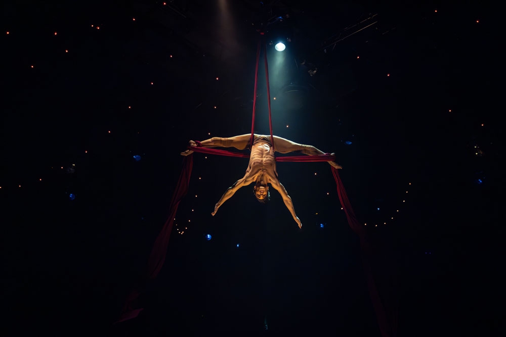 A performer hanging in the air, La Clique HOTA 