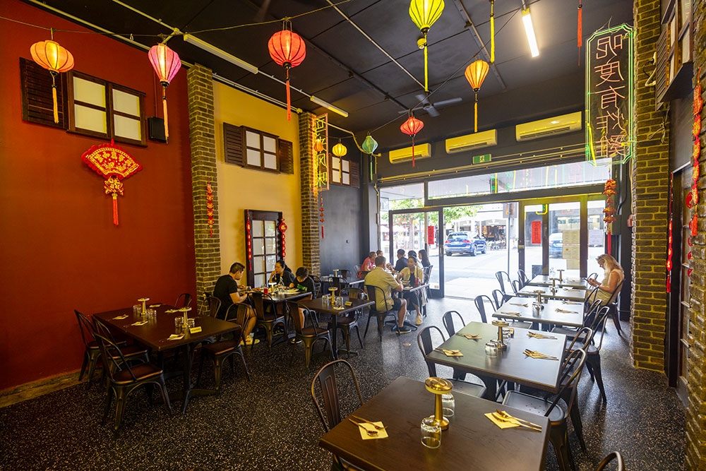 Lantern lit interior of Lemak Kitchen & Bar