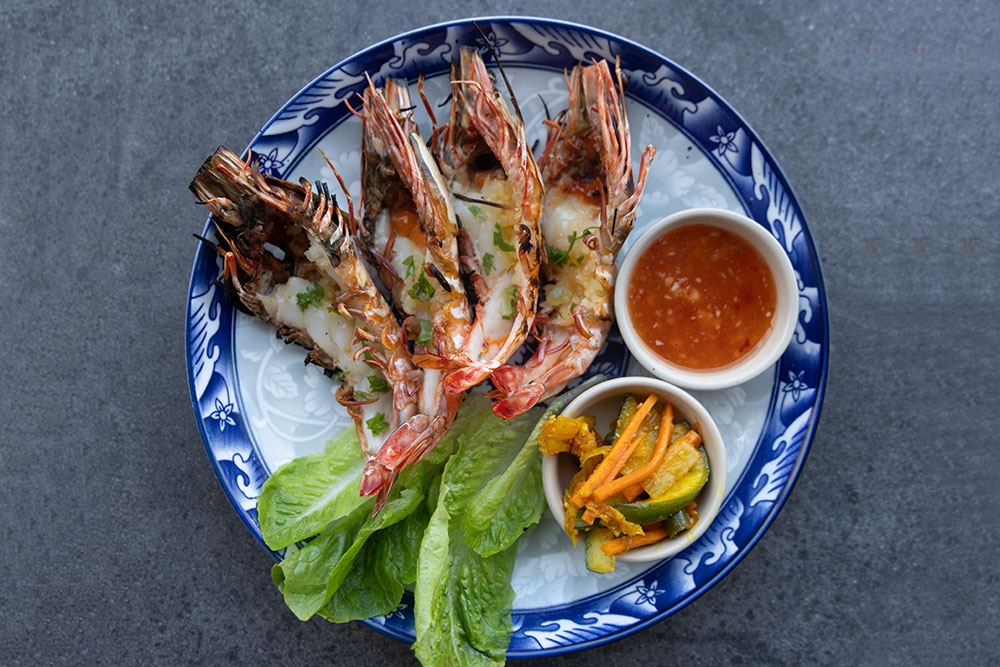 Plate of jumbo prawns with chilli sauce at Lemak Kitchen 