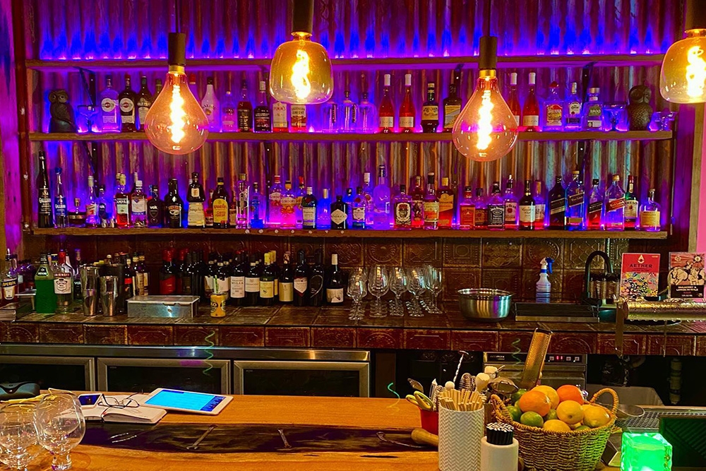 Purple lights in the bar at Little Aladdin Graceville
