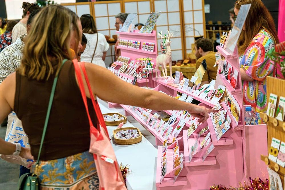 Womanu buying jewellery Christmas Made Local Market
