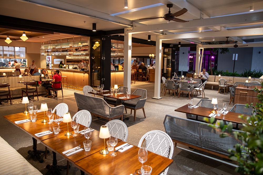 Indoor and outdoor seating area Mademoiselle Portside