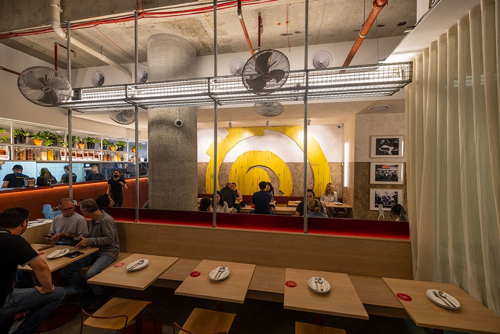 People dining inside Mamak Malaysian Roti & Satay Brisbane CBD