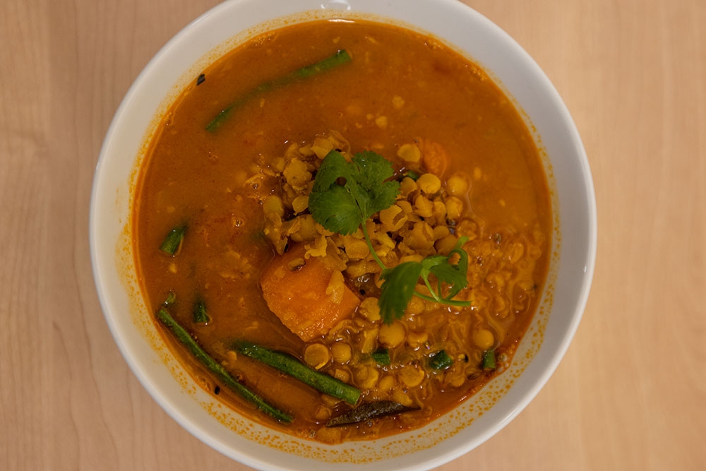 Vegetarian curry in a bowl at Mamak Malaysian Roti & Satay Brisbane CBD