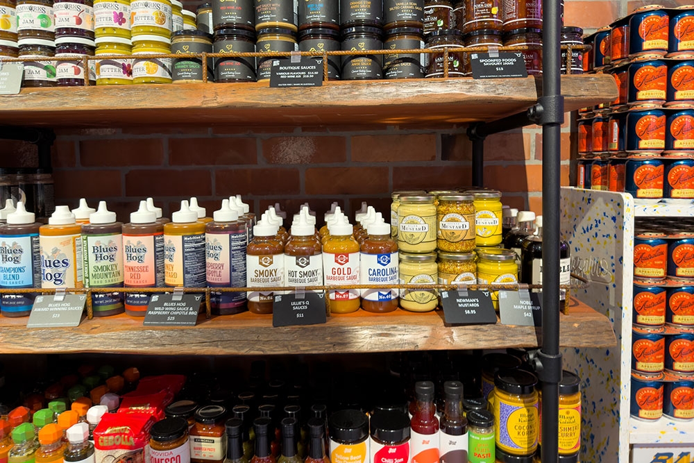 shelves of condiments at Meat at Billy's
