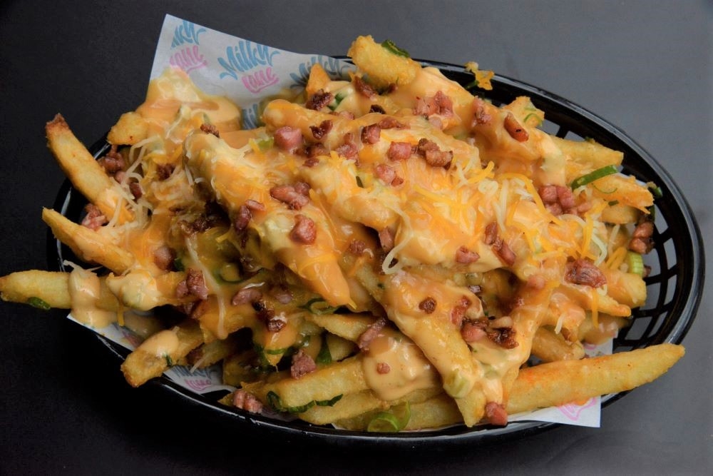 Loaded fries in melted cheese, bacon bits, shallots, cheese gravy and Milky Lane's special sauce at Milky Lane, Newstead 