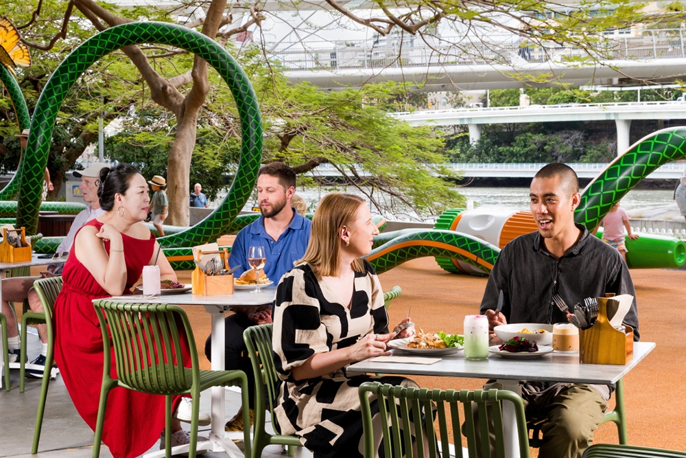People sitting at alfresco tables at GOMA Bistro