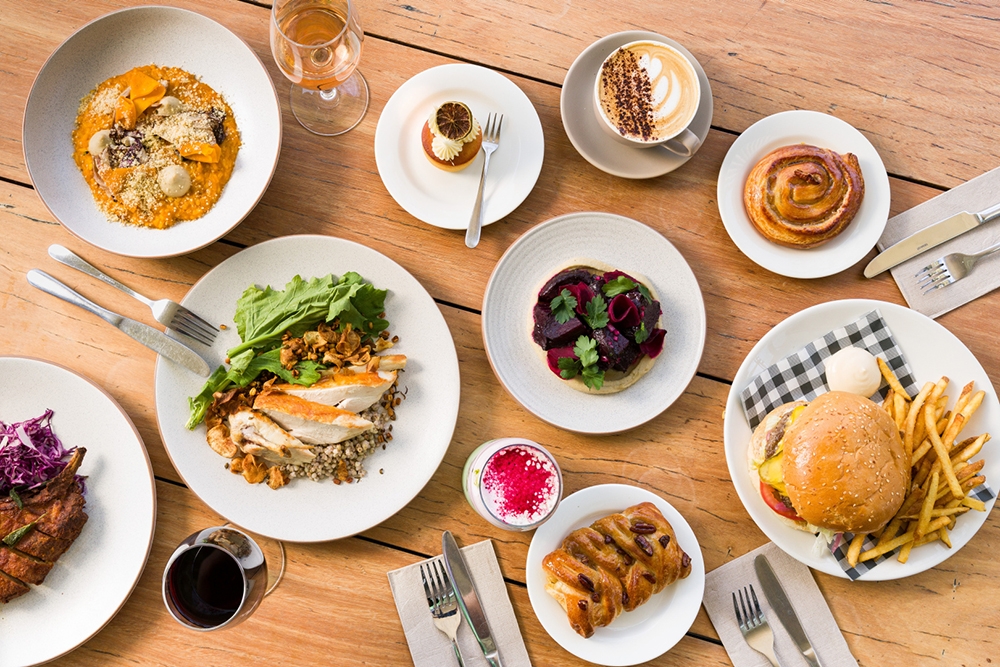 Plates of food served on a table at GOMA Bistro