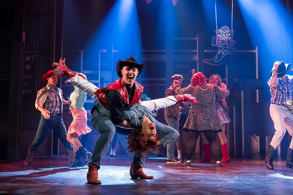 Actors on stage at Footloose The Musical
