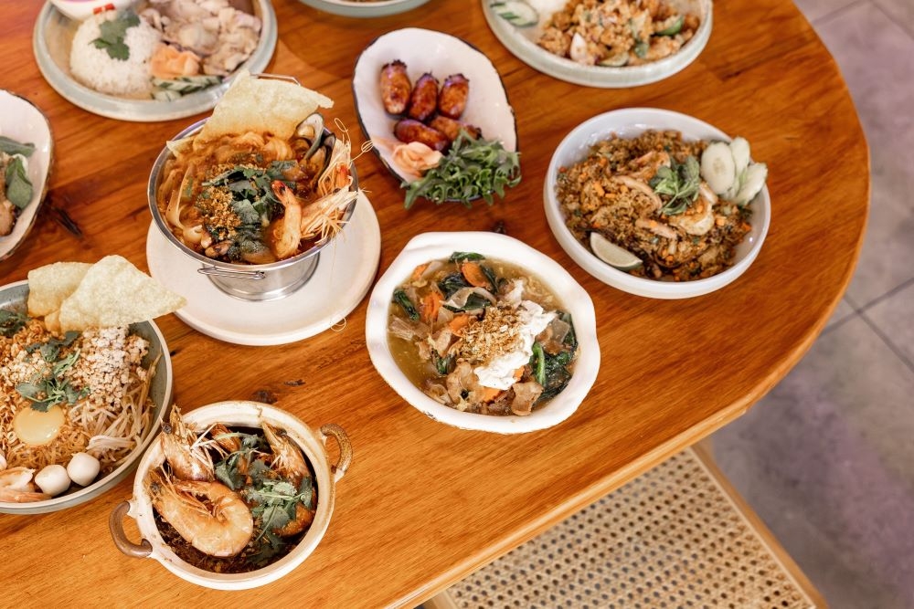 Plates of Thai street food at New Season Asian, Brisbane