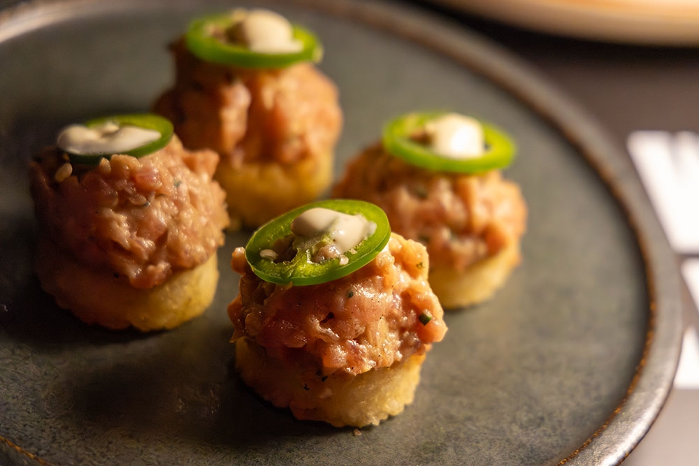 Tuna tostada on plate at Night Market