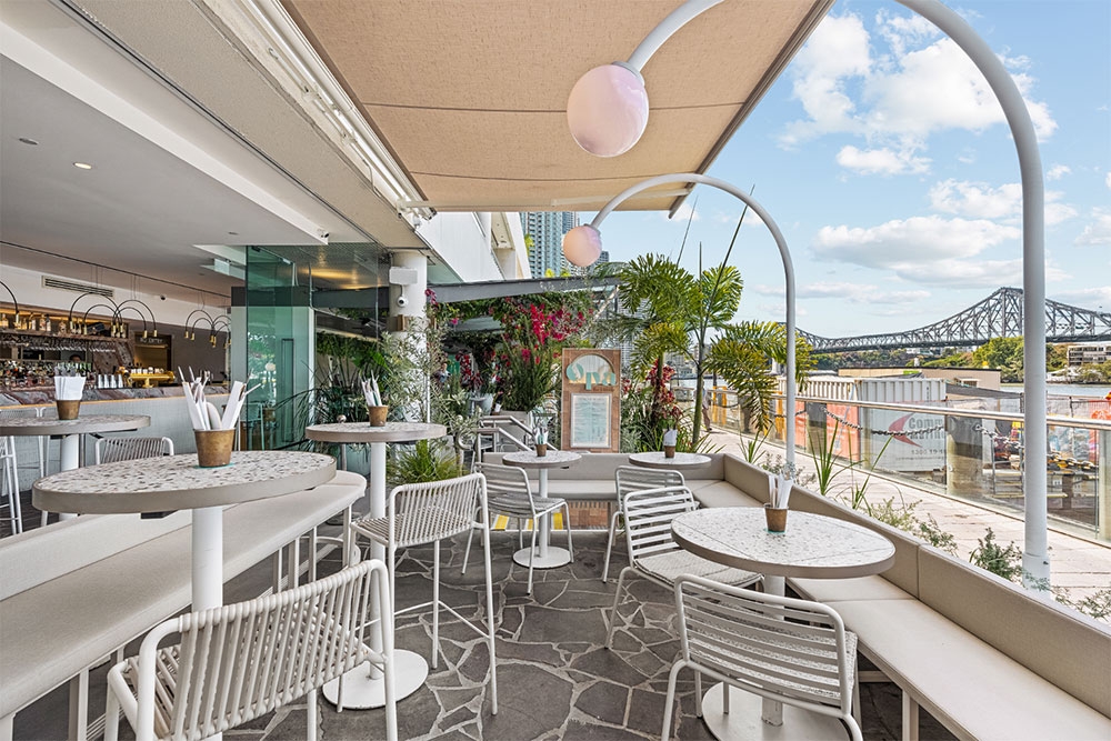 Outside seating overlooking Story Bridge and Brisbane River at Opa Bar & Mezze
