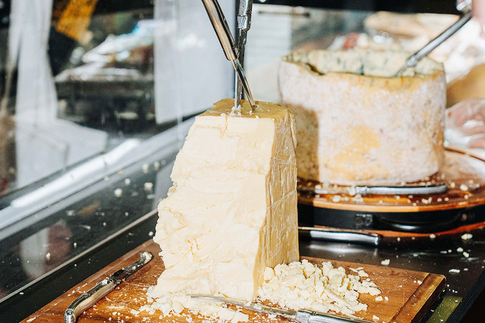 Slabs of cheese at cheese and wine festival