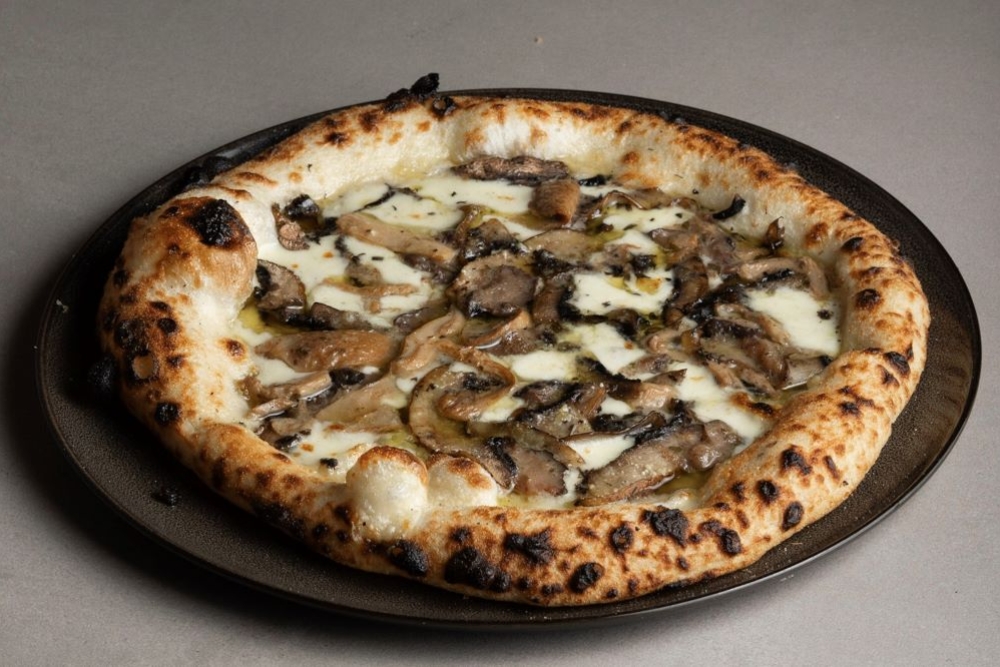 Pizza on a tray at Paninni's Italian Restaurant 