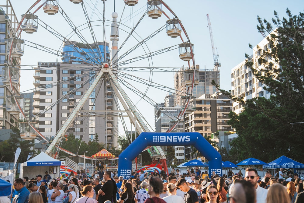 Crowd and ferris wheel at Paniyiri Greek Festival 