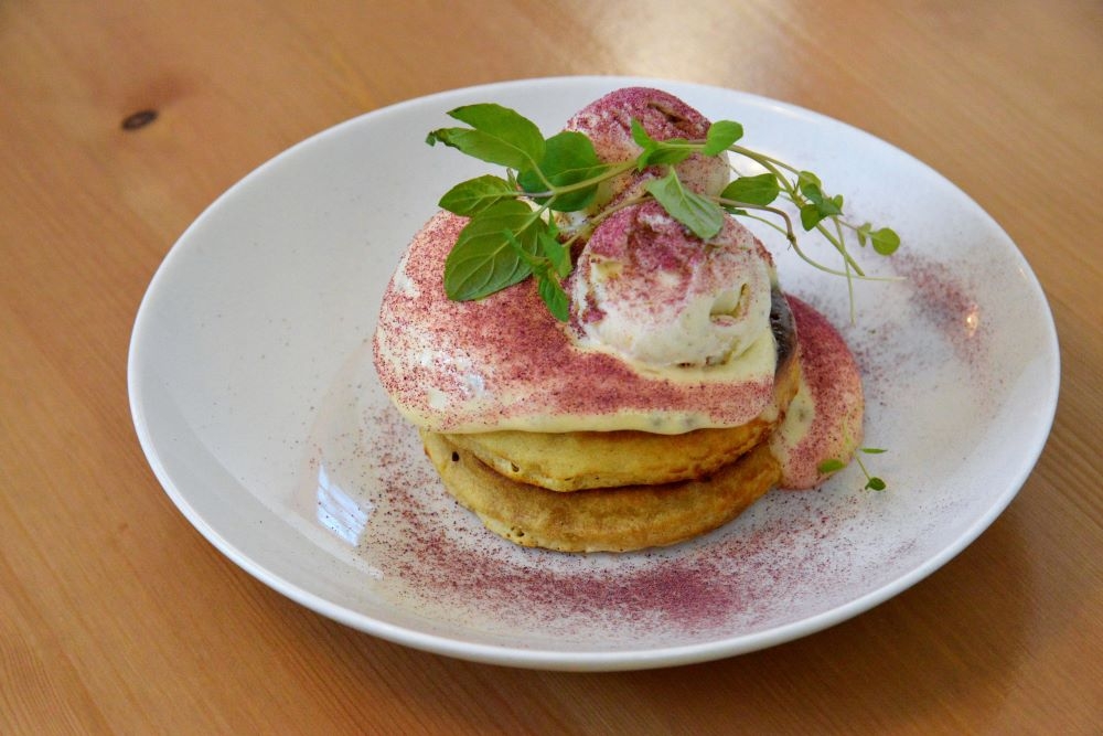 Hotcakes on a plate at Peach Cafe, Auchenflower 