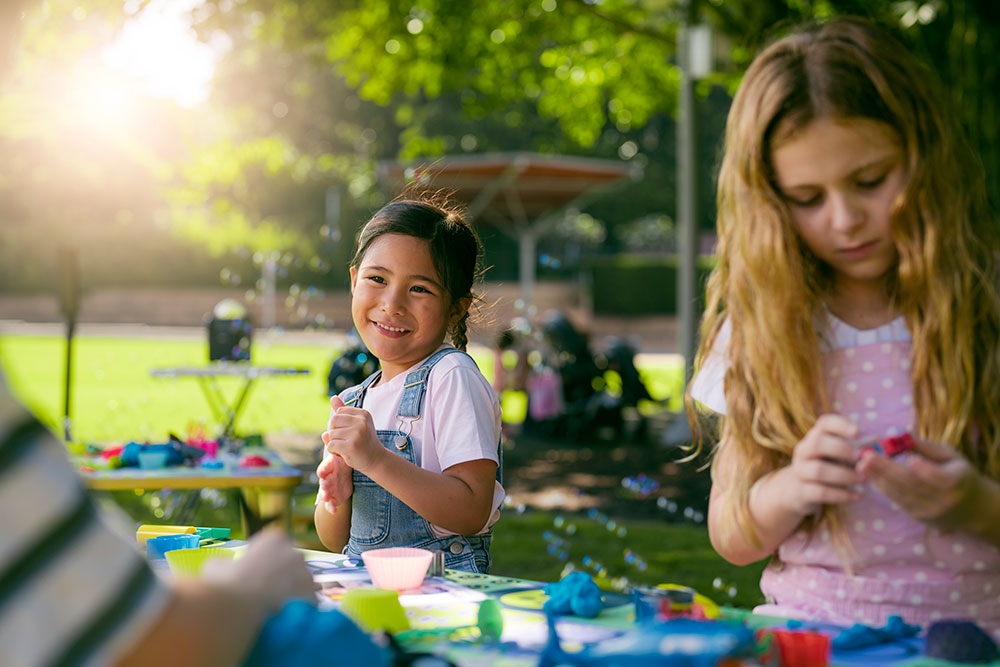 Children doing craft at Playtopia, Roma Street Parkland 