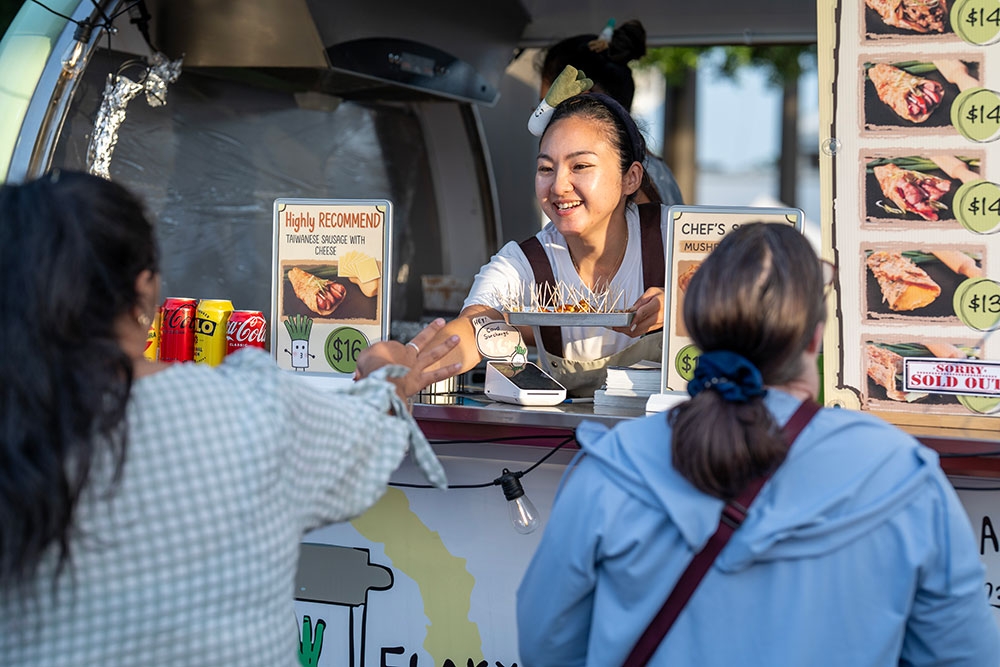 Food vendor at Queens Wharf market
