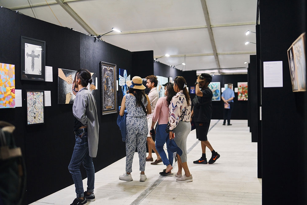 People looking at art Recovered Futures Art Exhibition Brisbane City
