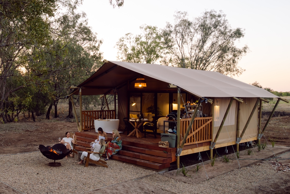 People on deck at Riverbank Glamping Chinchilla 